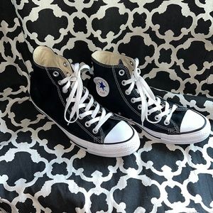 Black and white high top converse